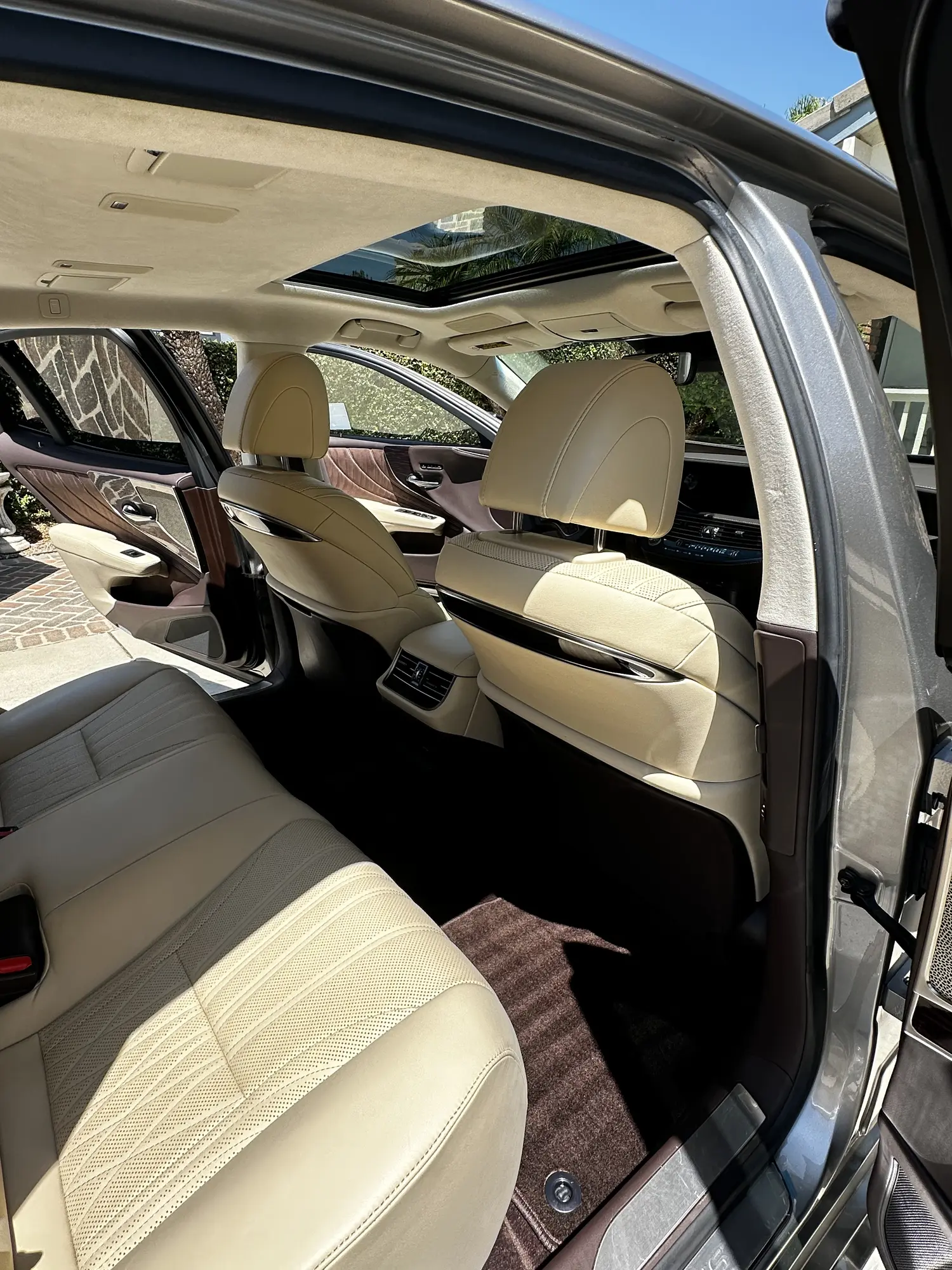 Beige leather SUV seats after an interior detail
