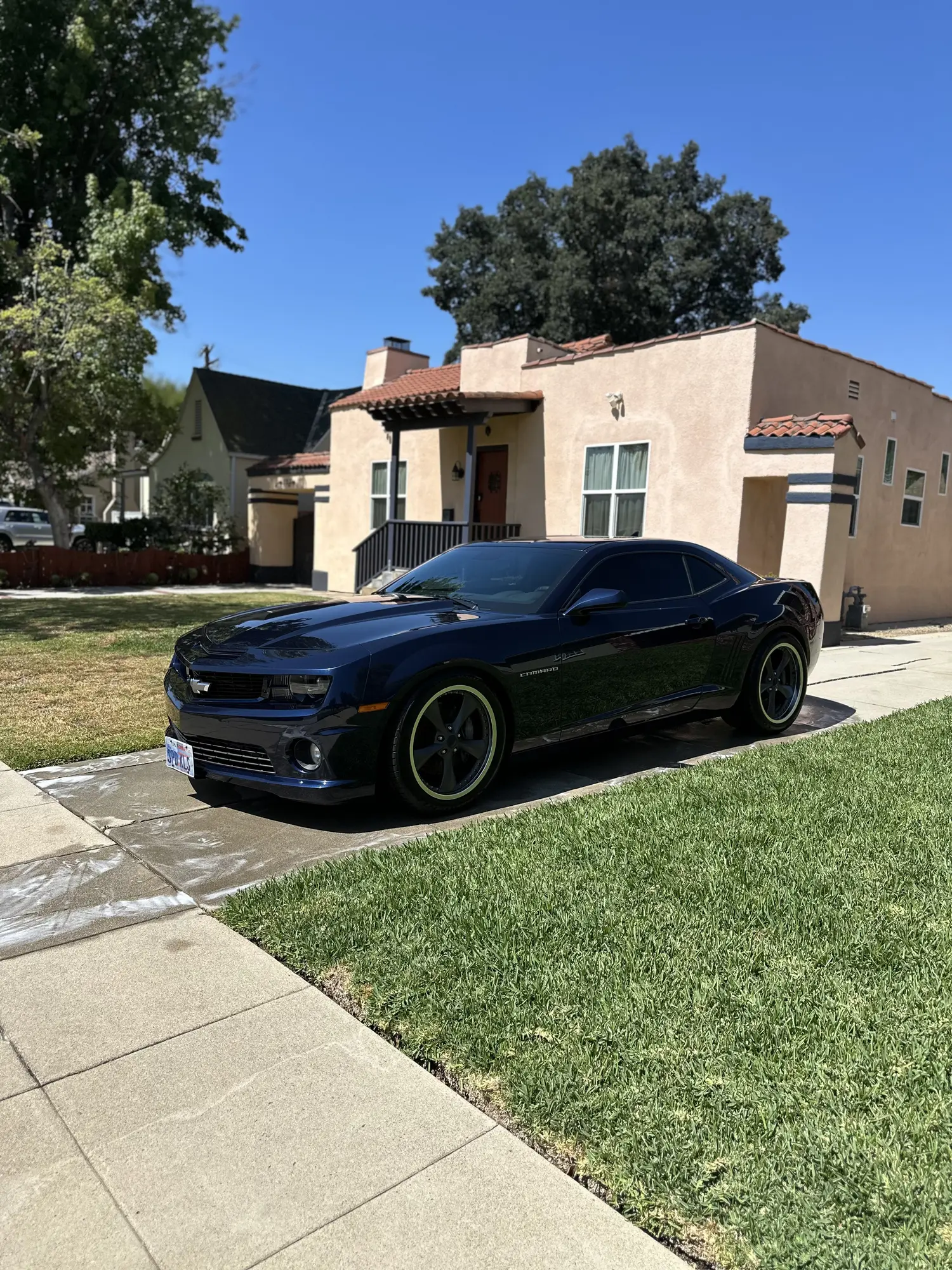 Dark blue Chevy Camaro after a mobile detail at a SGV home