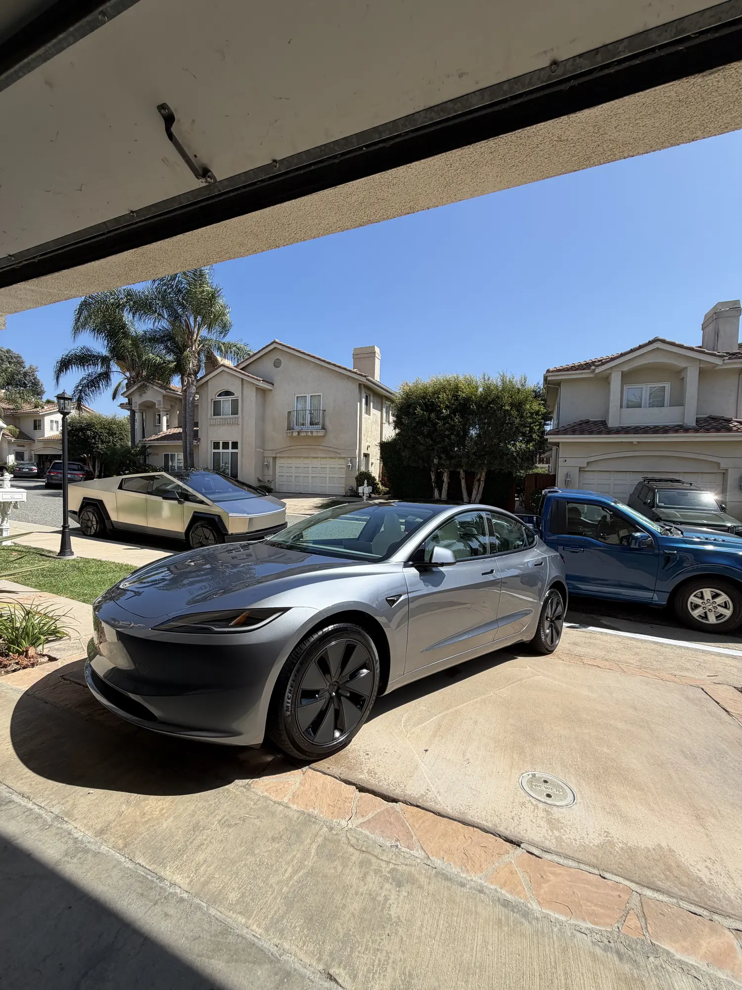 Gray Tesla Model 3 after a mobile wash