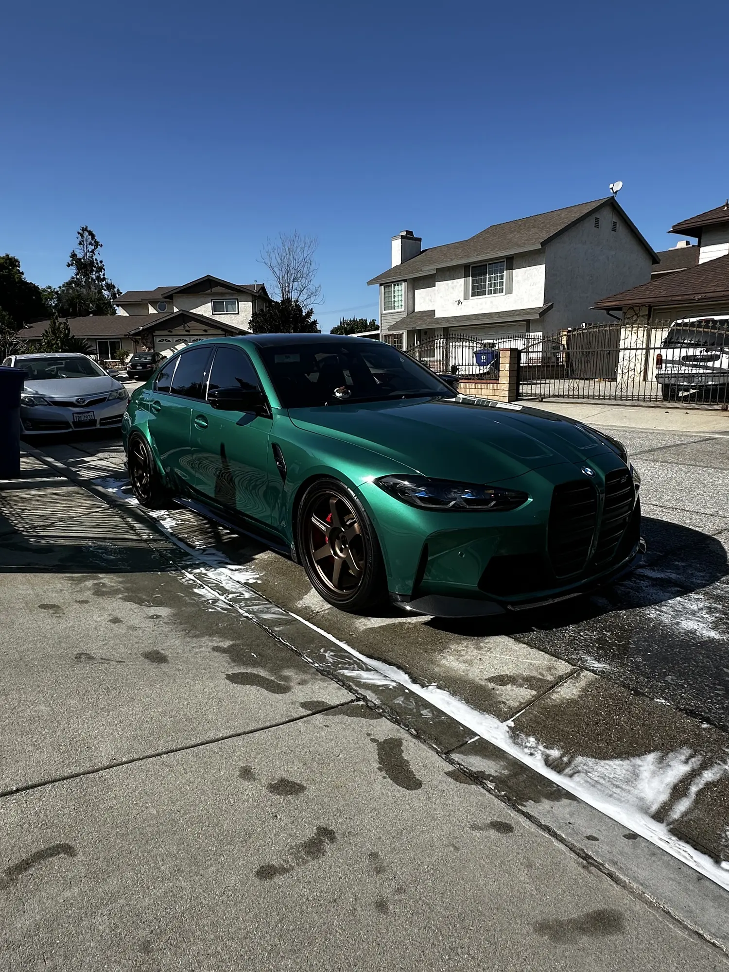 Green BMW M4 after a mobile detail