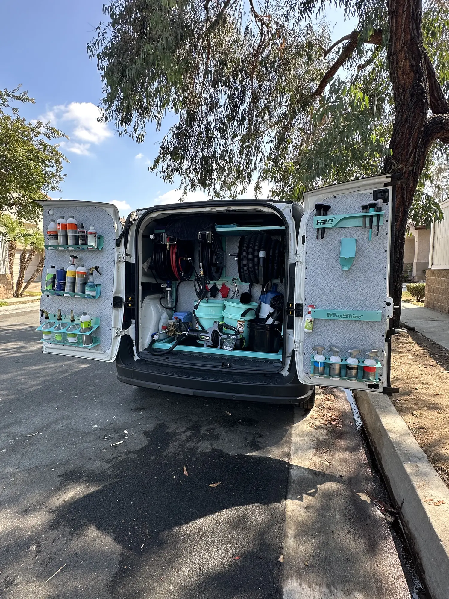 SoCal Mobile Detailerz van with the full detailing setup on site