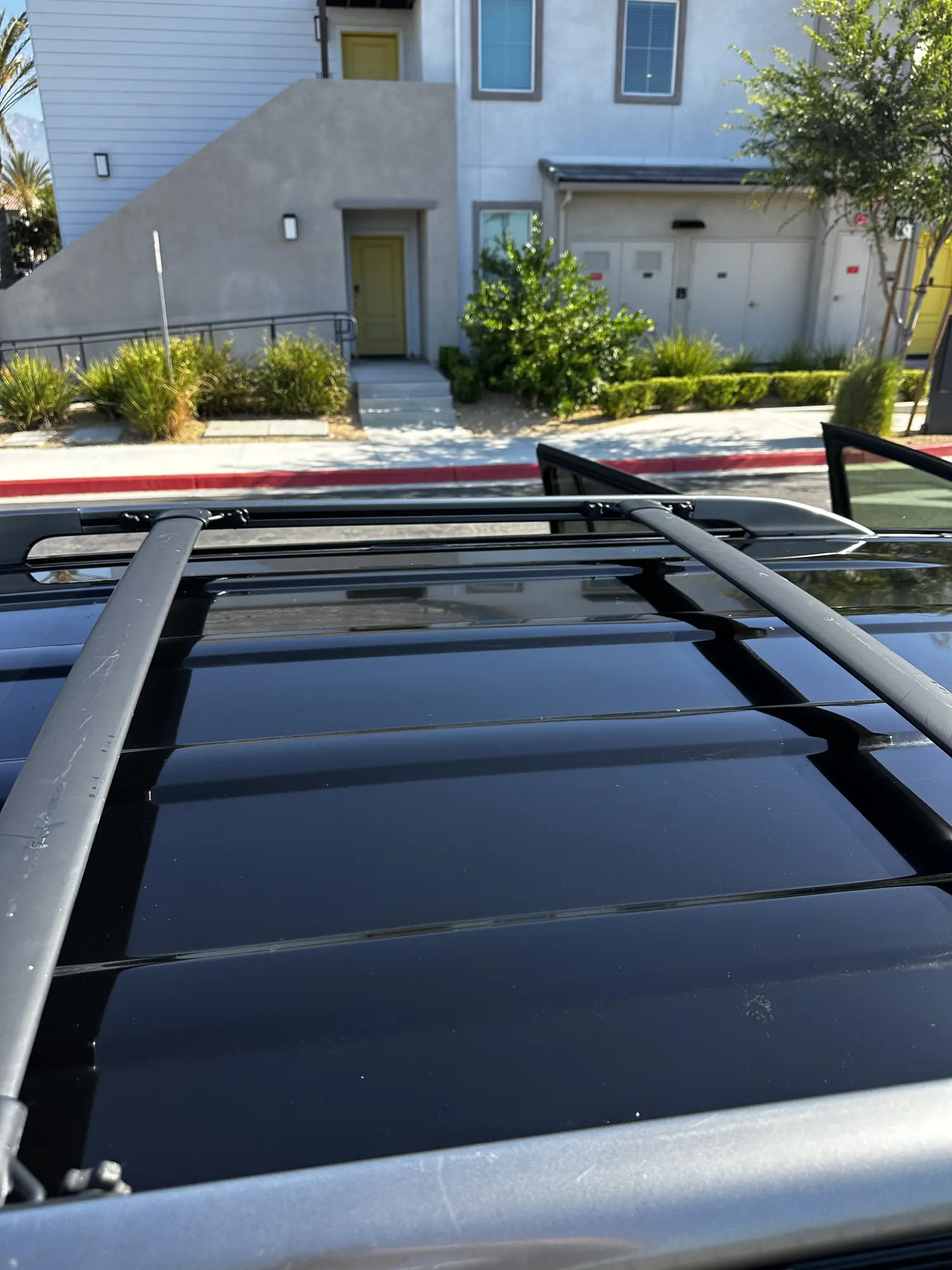 Sunroof glass cleaned during a detail