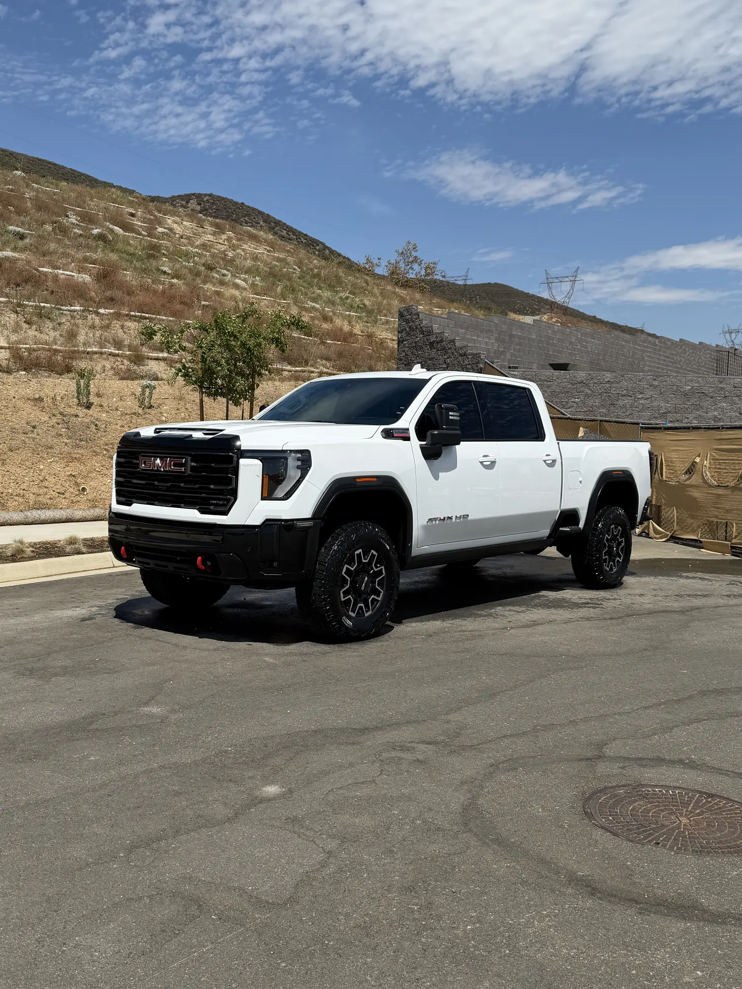White GMC Sierra pickup after a detail